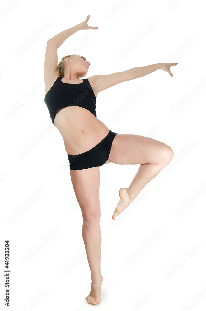 The girl the trainer on dances isolated on white background The girl the trainer on dances isolated on white background