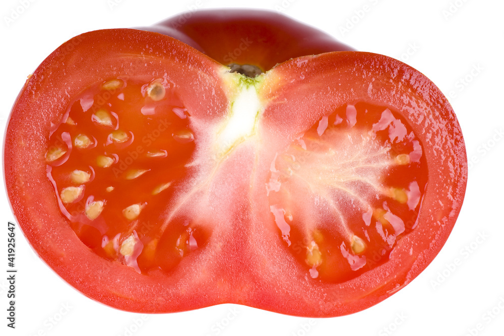 Half of tomato isolated on white background Half of tomato isolated on white background