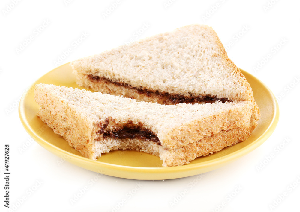 Bitten sandwiches with chocolate on plate isolated on white