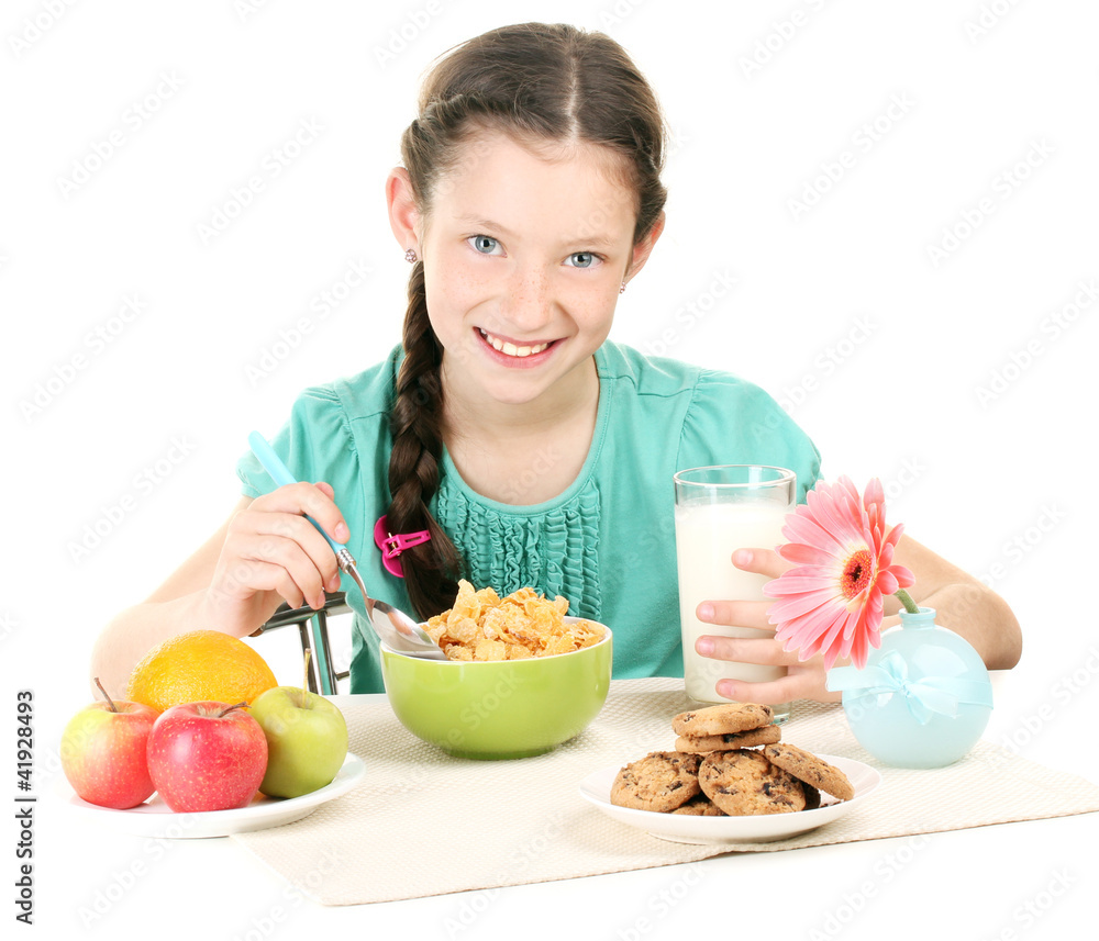 little beautiful girl have a breakfast on white background little beautiful girl have a breakfast on white background