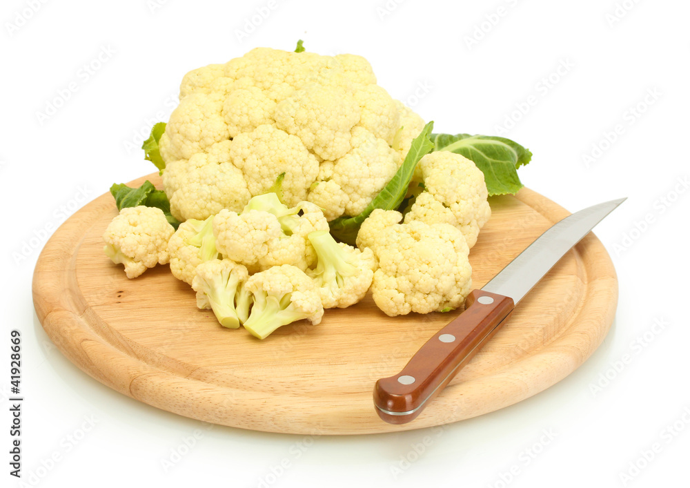 Fresh cauliflower and knife on cutting board isolated on white Fresh cauliflower and knife on cutting board isolated on white