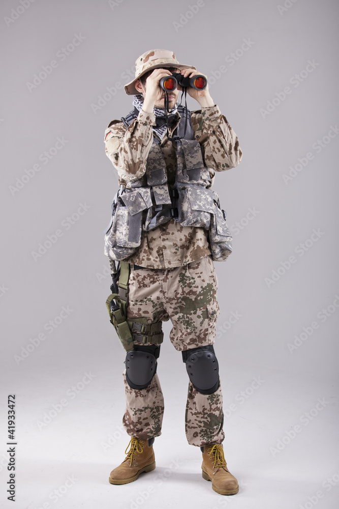 Soldier with binoculars Soldier with binoculars