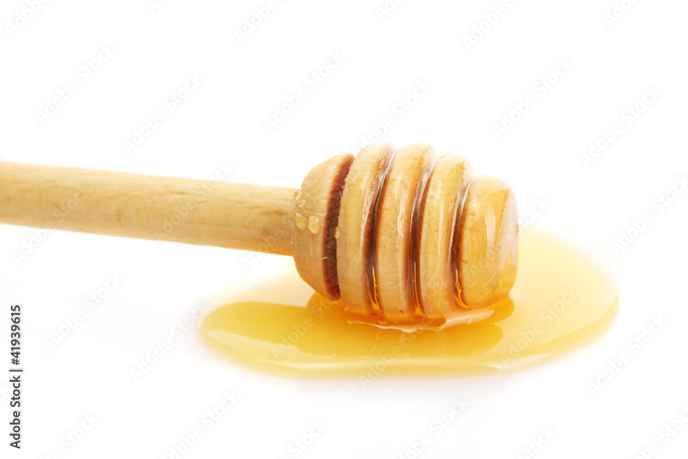 drizzler with sweet honey isolated on white drizzler with sweet honey isolated on white