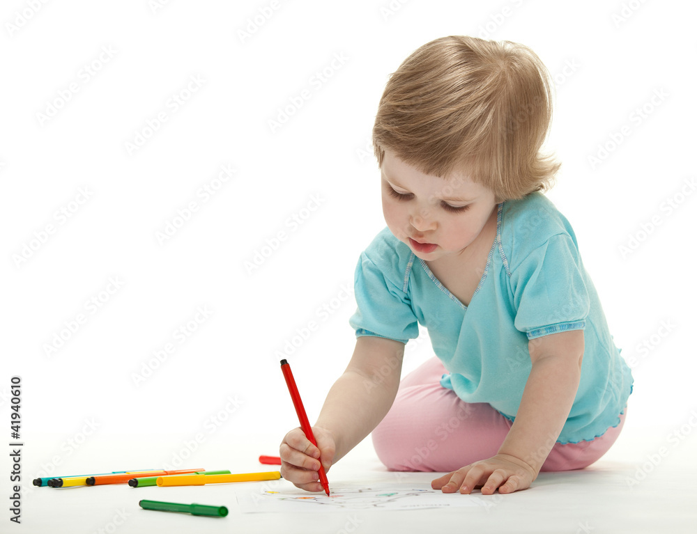 Baby girl drawing with colorful felt-tip pens Baby girl drawing with colorful felt-tip pens