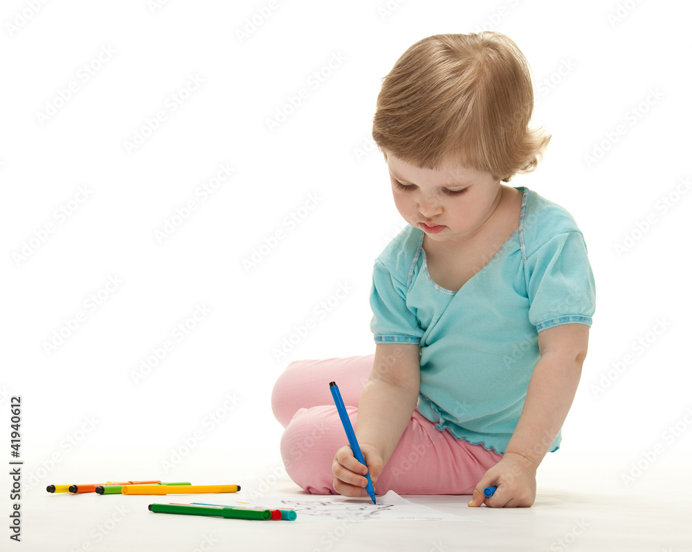 Baby girl drawing with colorful felt-tip pens Baby girl drawing with colorful felt-tip pens