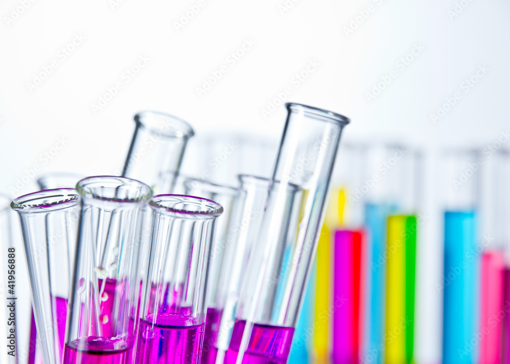Test tubes filled with colored liquids Test tubes filled with colored liquids