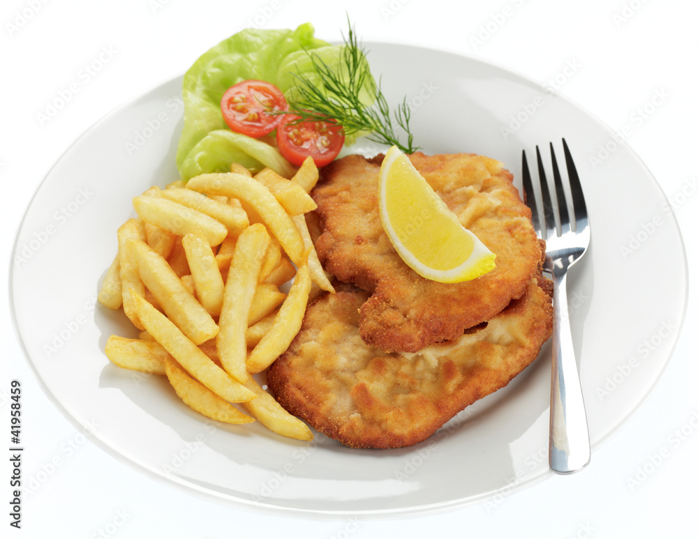 Schweineschnitzel Wiener Art mit Pommes frites Schweineschnitzel Wiener Art mit Pommes frites