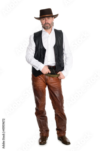 man in leather pants with gun