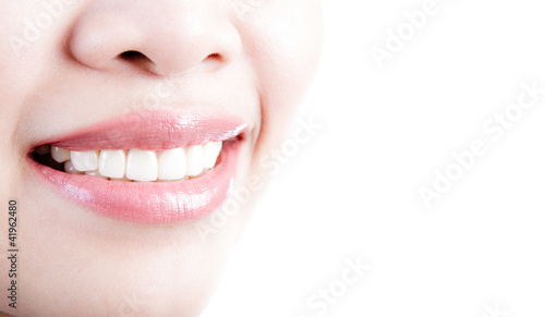 Beautiful young woman teeth isolated over white background