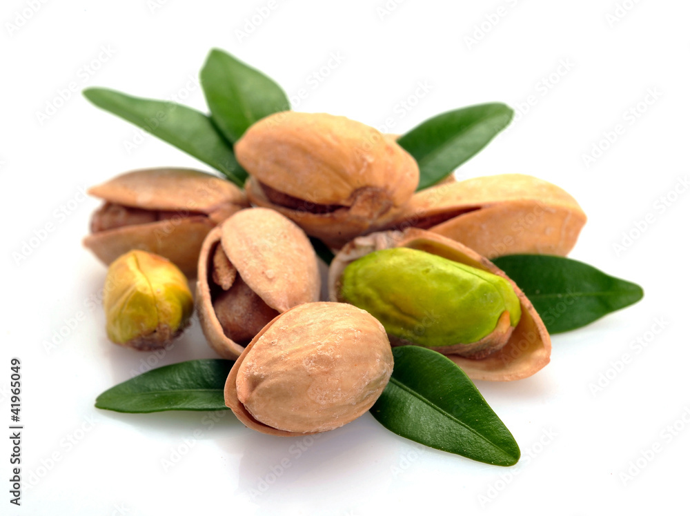 Fototapeta premium Pistachios on a white background