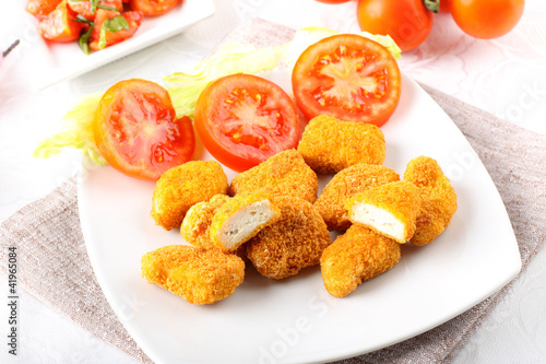 Chicken nuggets on dish