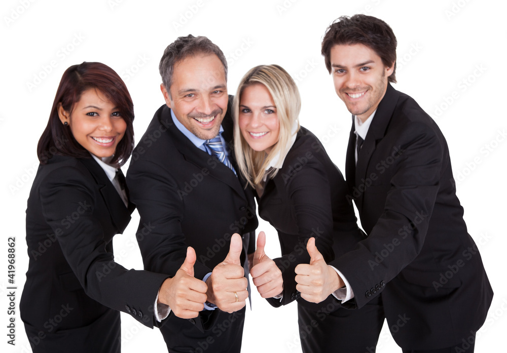 Happy business team celebrating a success Happy business team celebrating a success