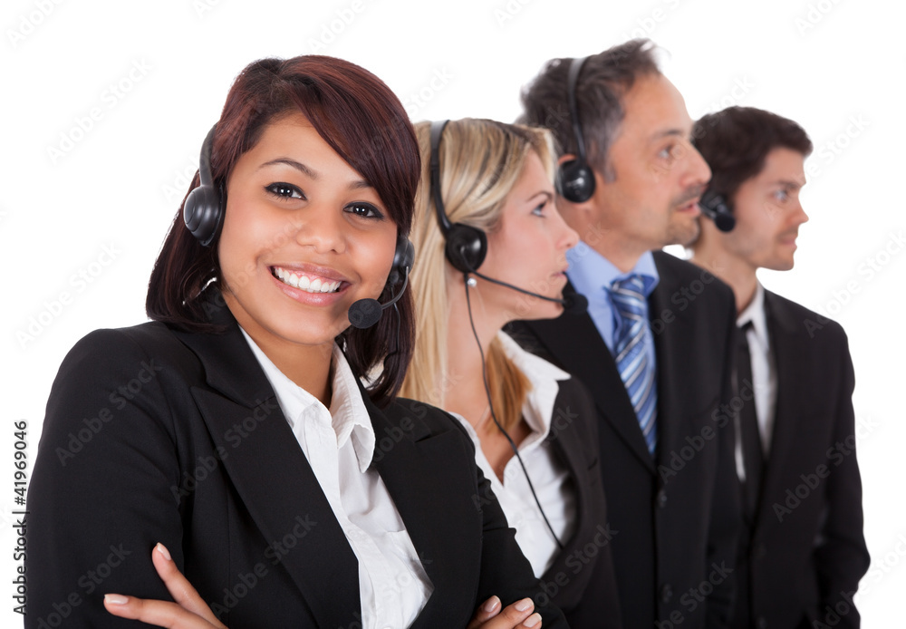 Confident business team with headsets Confident business team with headsets