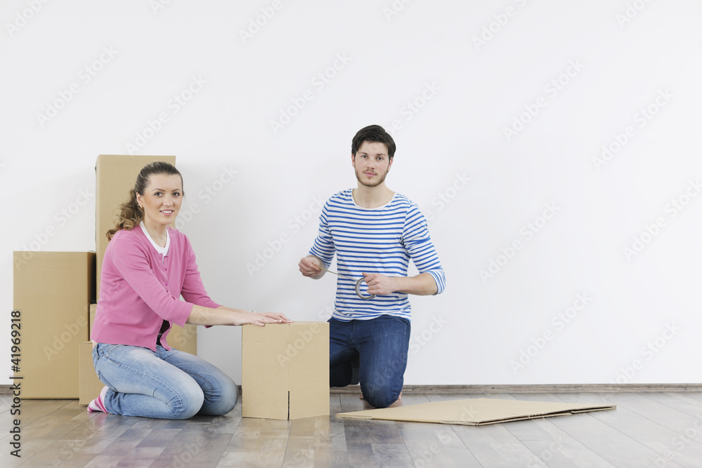 Young couple moving in new home