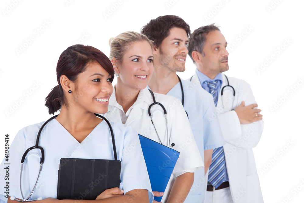Group of doctors standing together over white Group of doctors standing together over white