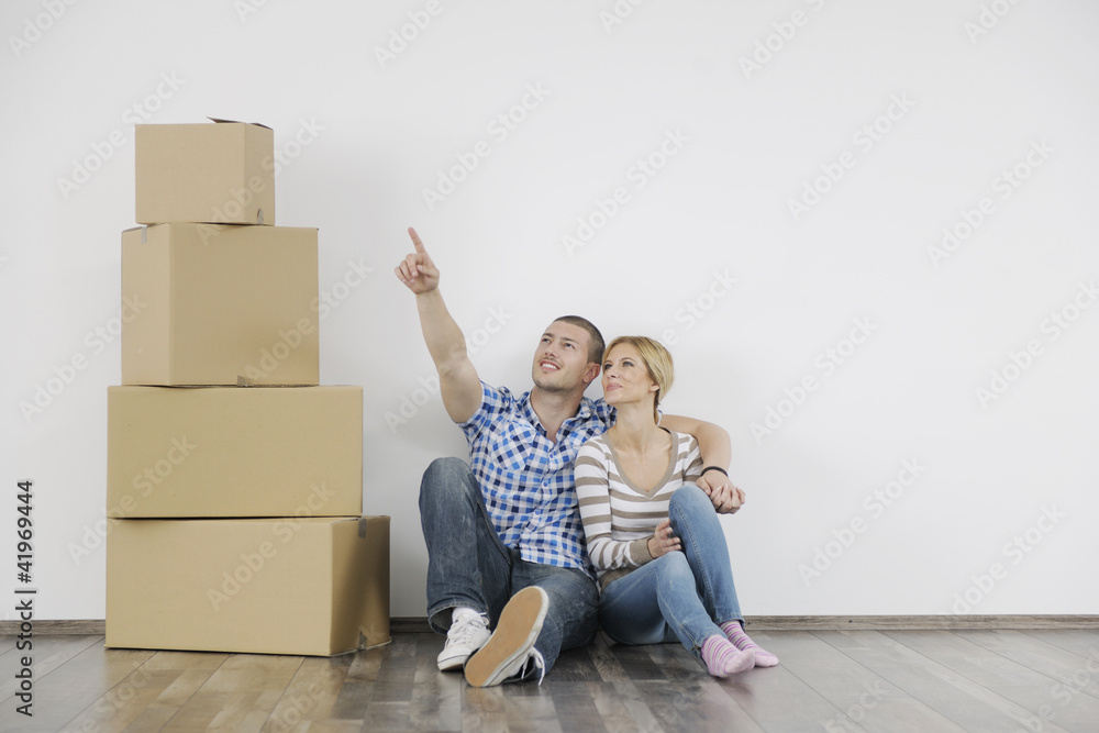 Young couple moving in new home Young couple moving in new home