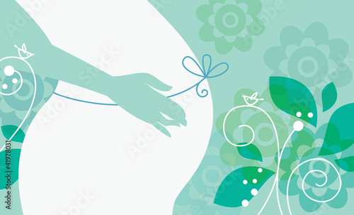 Silhouette of pregnant woman in spring