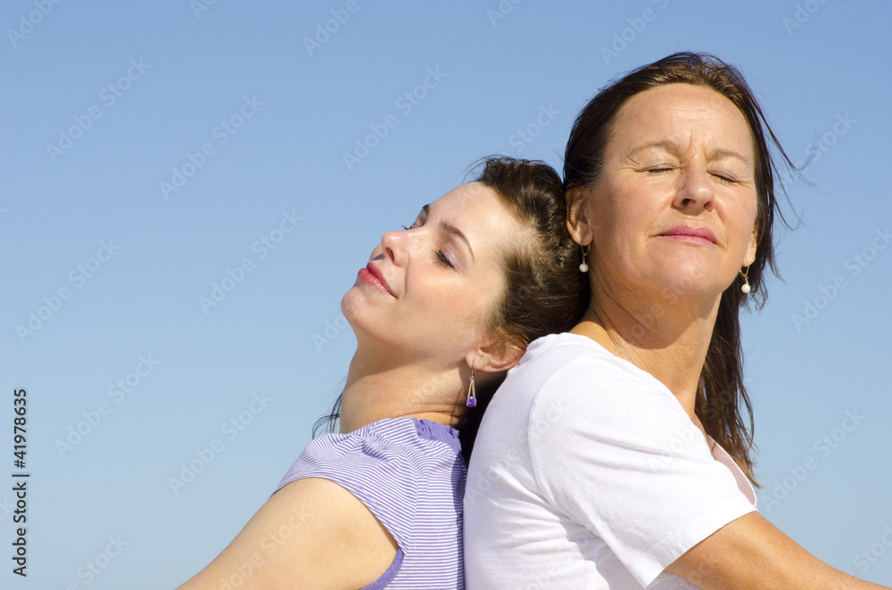 Relaxed mother and daughter together Relaxed mother and daughter together