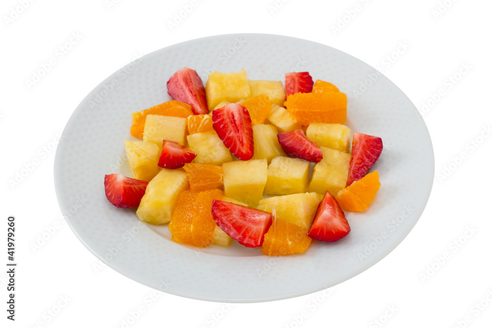 fruit salad on the plate and glass of water fruit salad on the plate and glass of water