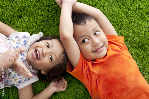 Cute happy asian siblings photo