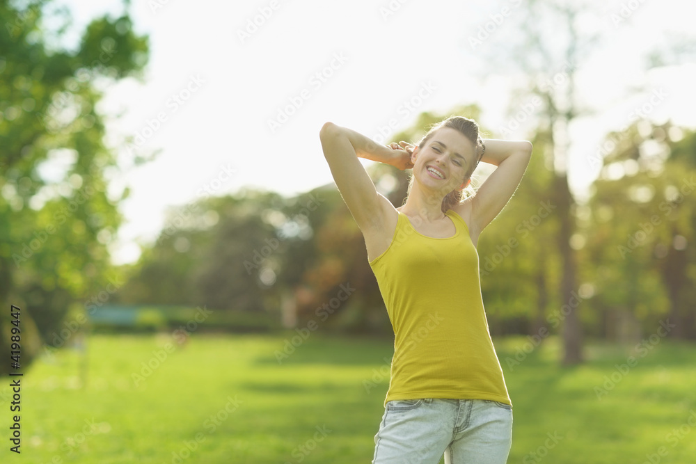 Portrait of beautiful woman relaxing in park Portrait of beautiful woman relaxing in park