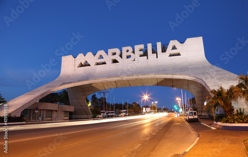 Marbella Arch illuminated at night. Andalusia, Spain photo