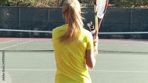 full court tennis game in slow motion