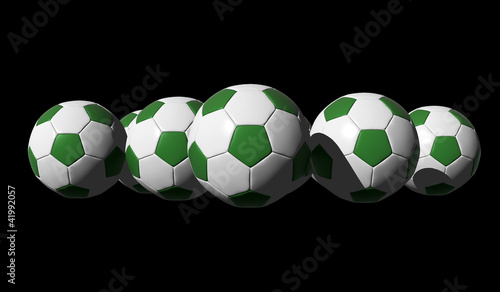 3D rendered green soccer balls