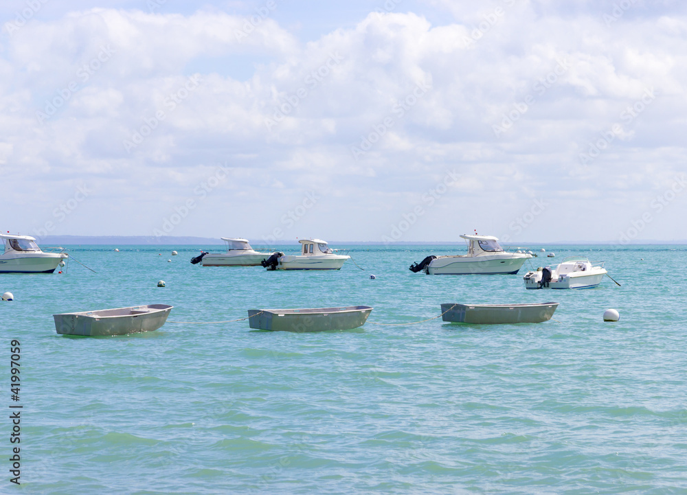 Obraz premium Beautifull boats on the calm blue sea, northern France