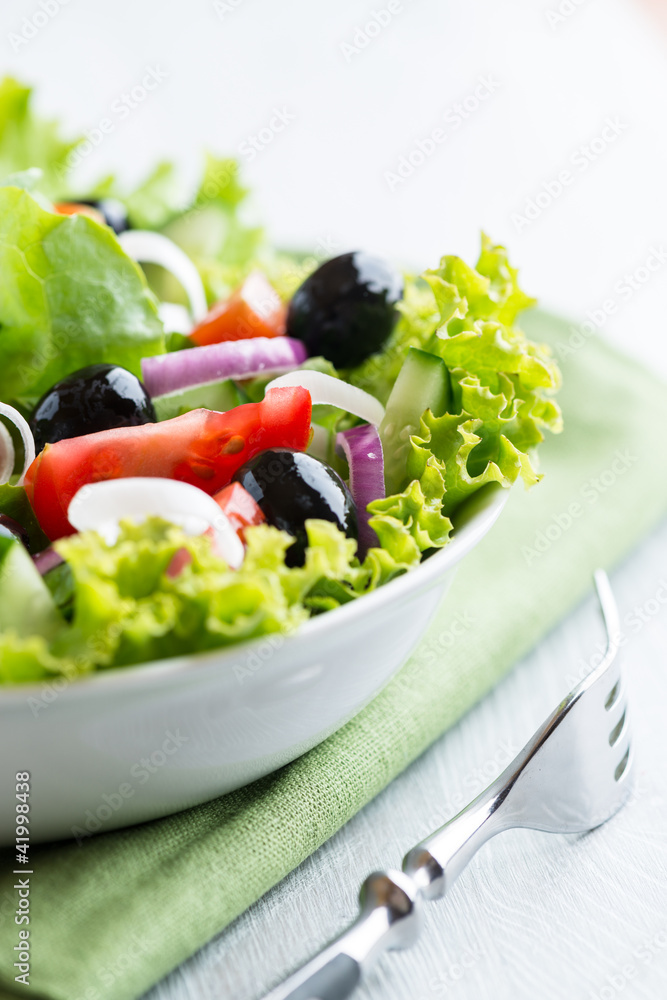 Closeup of mediterranean salad with black olives Closeup of mediterranean salad with black olives