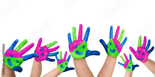 Many coloured child´s hand on white background