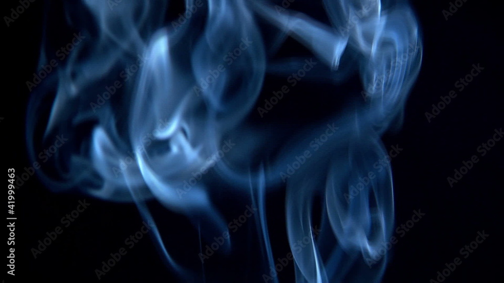 billowing blue smoke rises through screen billowing blue smoke rises through screen