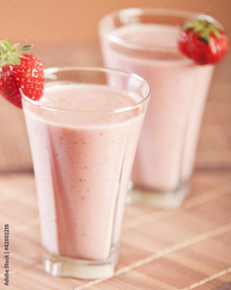 Smoothie strawberry served with fresh strawberry Smoothie strawberry served with fresh strawberry