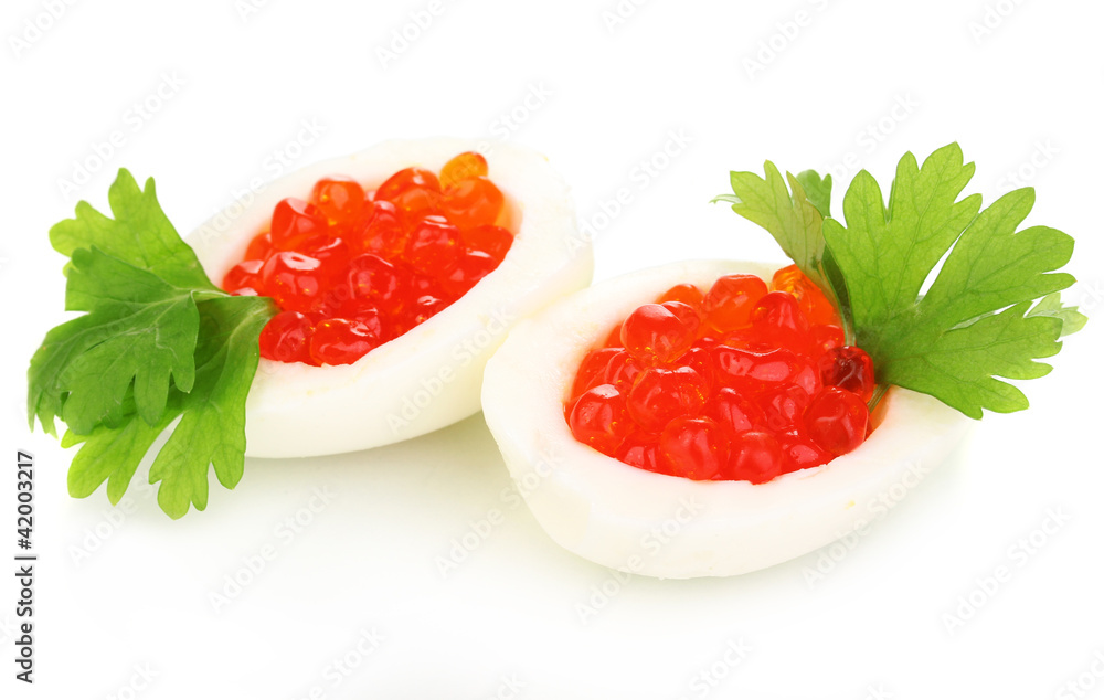 Red caviar in eggs isolated on white Red caviar in eggs isolated on white