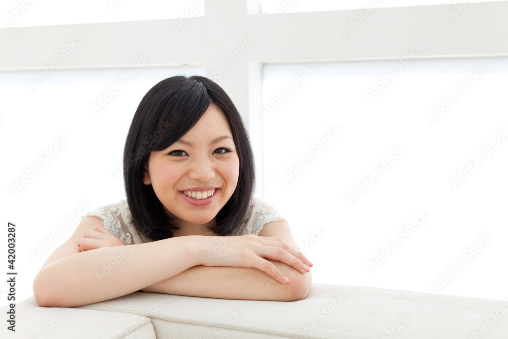 Beautiful young woman relaxing living room. Portrait of asian. Beautiful young woman relaxing living room. Portrait of asian.