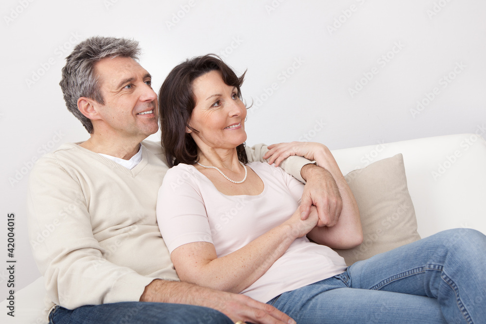 Happy mature couple dreaming about the future Happy mature couple dreaming about the future