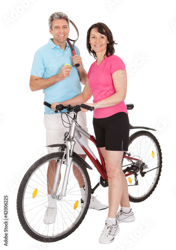 Mature active couple doing sports