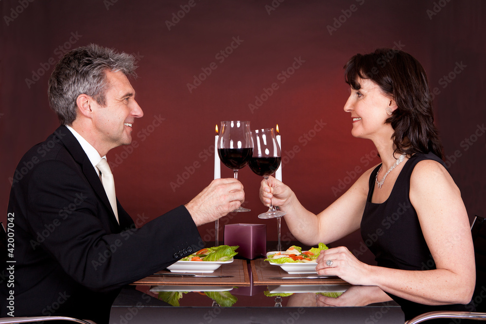 Couple at romantic dinner in restaurant Couple at romantic dinner in restaurant