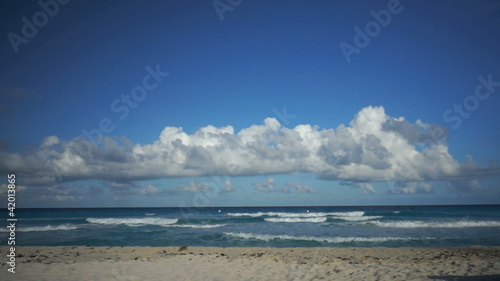 Blue cloudy sky beach