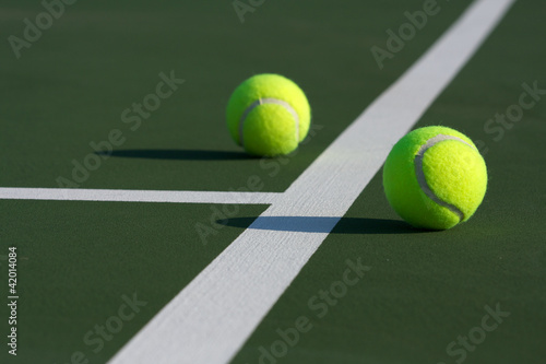 Pair of Tennis Balls on the Court