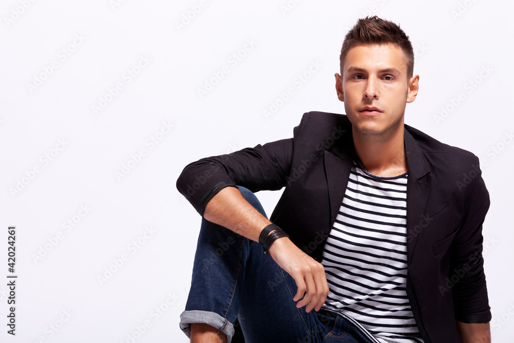 young man sitting young man sitting