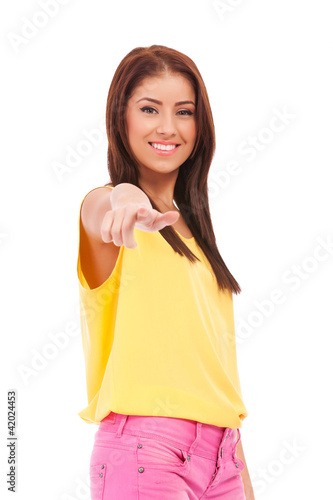 Young female pointing at you