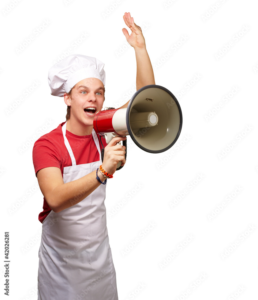 portrait of young cook man shouting with megaphone over white ba portrait of young cook man shouting with megaphone over white ba