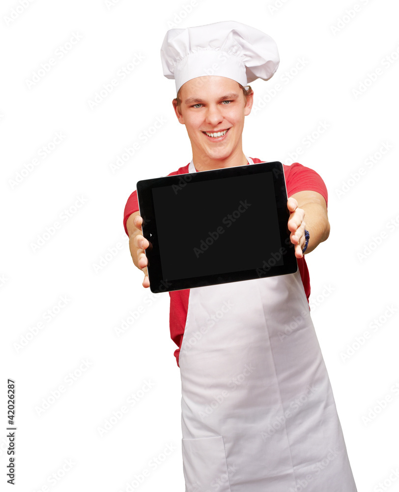 portrait of young cook man showing a digital tablet over white b portrait of young cook man showing a digital tablet over white b