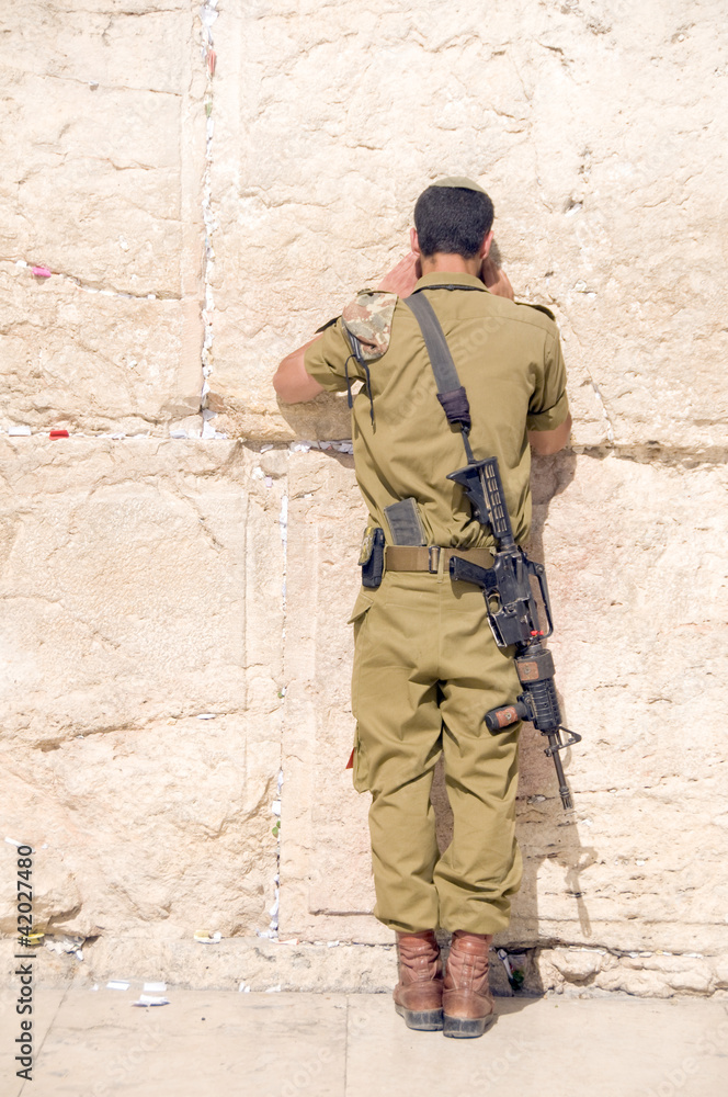 Israel military man praying The Western Wall Jerusalem Palestine