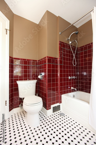 Classic antique brown and red bathroom.