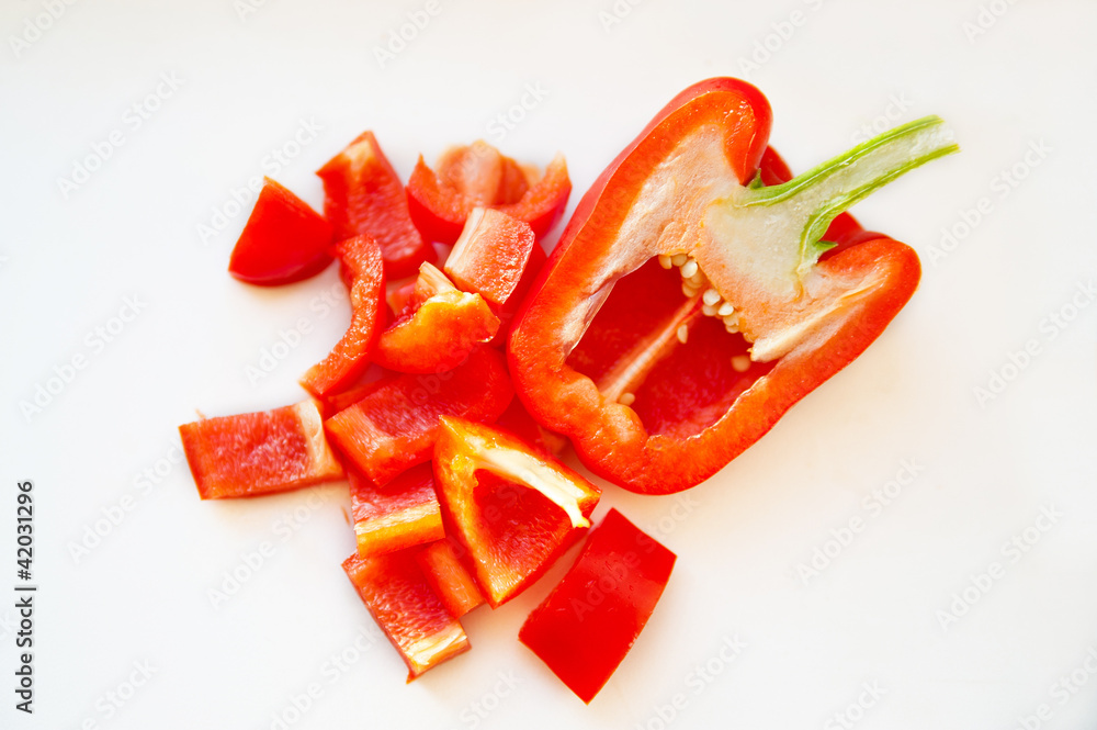 red pepper cutting - white background red pepper cutting - white background
