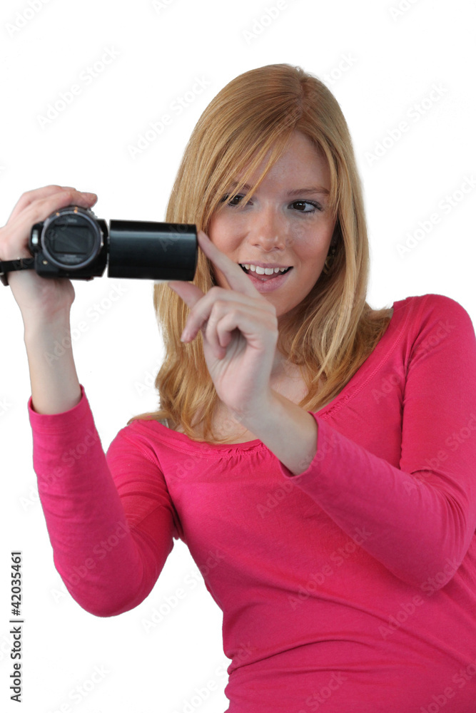 Woman filming with video camera Woman filming with video camera