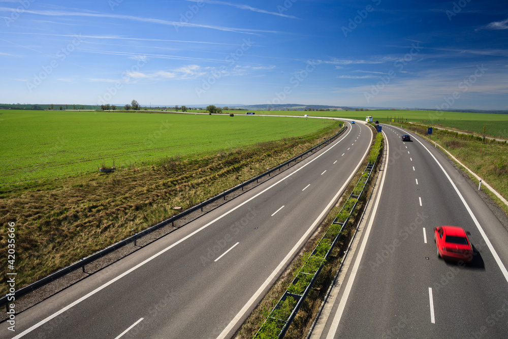 Fototapeta premium highway traffic on a lovely, sunny summer day