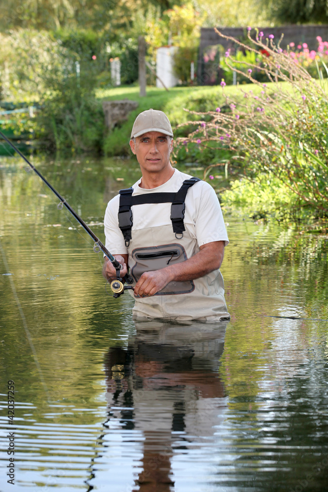Fisherman stuck in river Fisherman stuck in river